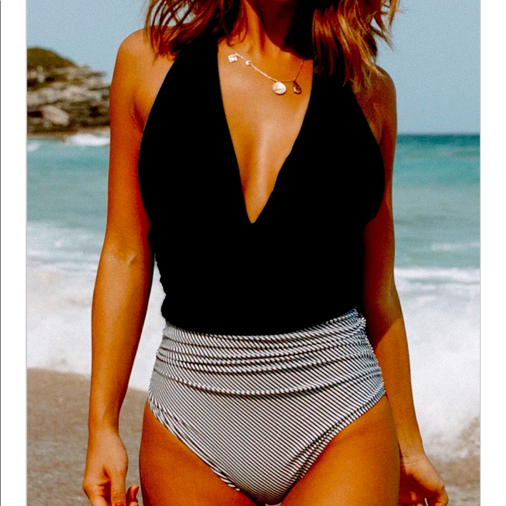 Brand new one piece. Never worn.